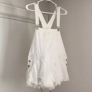 White denim cutoff overalls